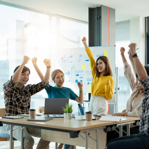 Featured Image for Speech Topic #3: Achieving Success The Sustainable Way (Image of a team of employees working well together)